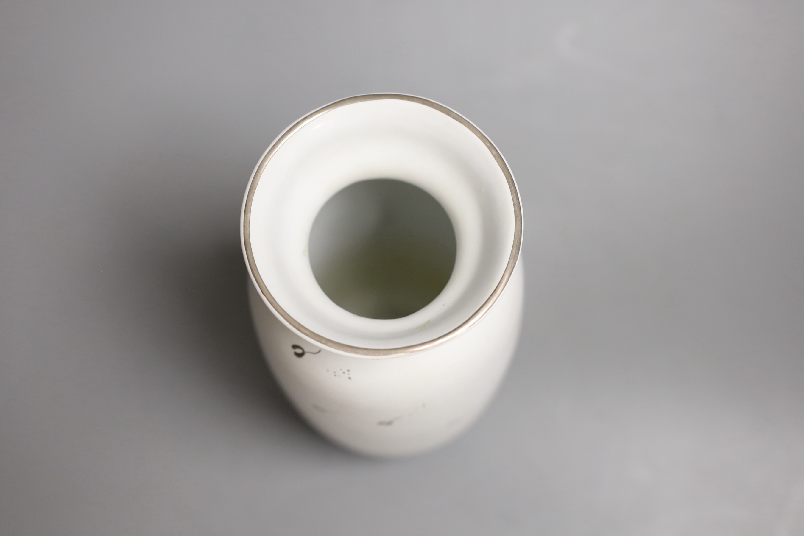 A Gustavsberg Stig Lindberg 215 shape Grazia vase decorated with a woman, vase and flowers, sprigs to the reverse, 20cm